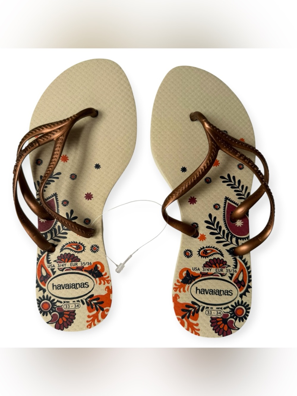 Havaianas Beige Flip Flops with Bronze Straps and Floral Print